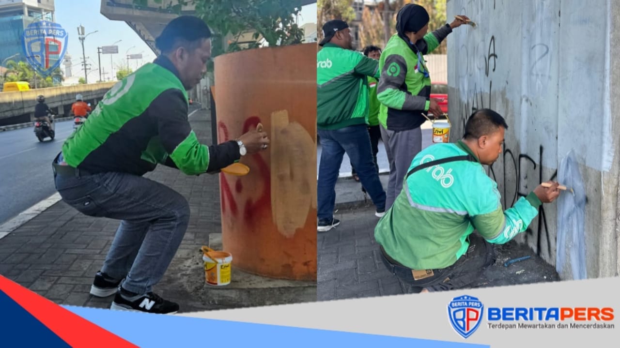 Jaringan Ojol Sulsel Bersihkan Coretan Vandalisme di Jantung Makassar