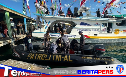 Danposal Pinrang Pimpin Pengamanan Festival Nelayan Ujung Labuang, Pastikan Arak-arakan 70 Kapal Berlangsung Aman