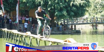 Semarak HUT RI Ke-81, Kodim 1409/Gowa Gelar Lomba Sepeda Lintas Kolam di Permandian Sileo