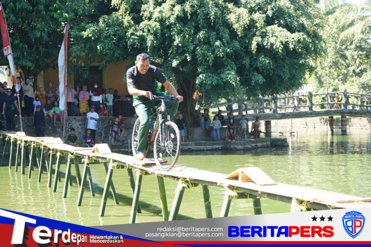 Semarak HUT RI Ke-81, Kodim 1409/Gowa Gelar Lomba Sepeda Lintas Kolam di Permandian Sileo